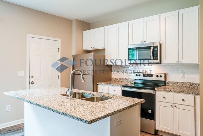 Building Photo - Townhome | Back Patio | Single -Car Garage...