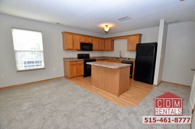 Building Photo - Wonderful Waukee Townhome