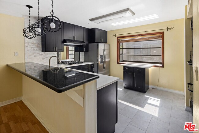 Building Photo - 13360 Maxella Ave