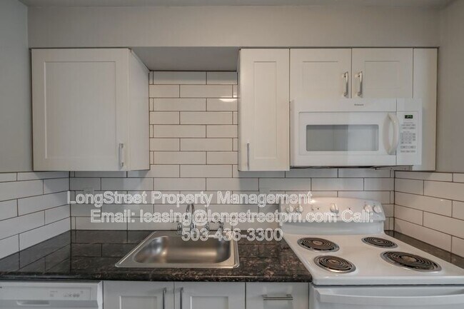 Building Photo - 205 6th Ave SW