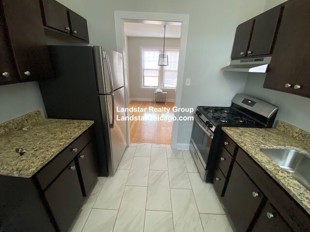 Building Photo - 5042 N Wolcott Ave