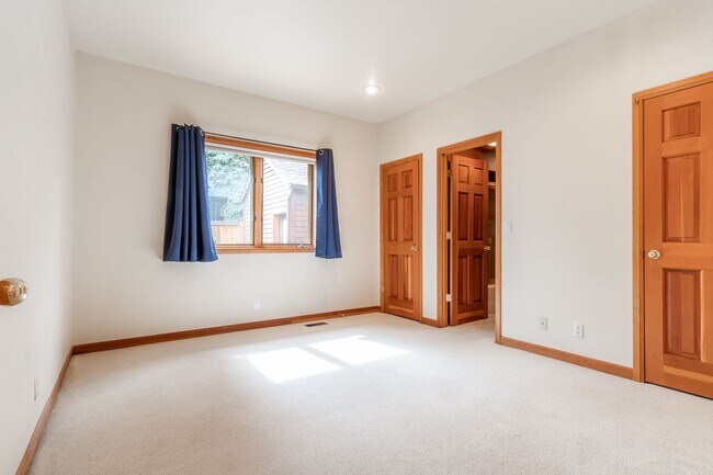 Building Photo - Private river access and stunning views from this home on Harmon Blvd! + Bonus Room