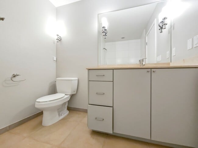 Building Photo - 3-Story Townhouse | 3 Bed, 3.5 Bath | Central Heating | Hardwood Floors | Carpeted Bedrooms | Off...