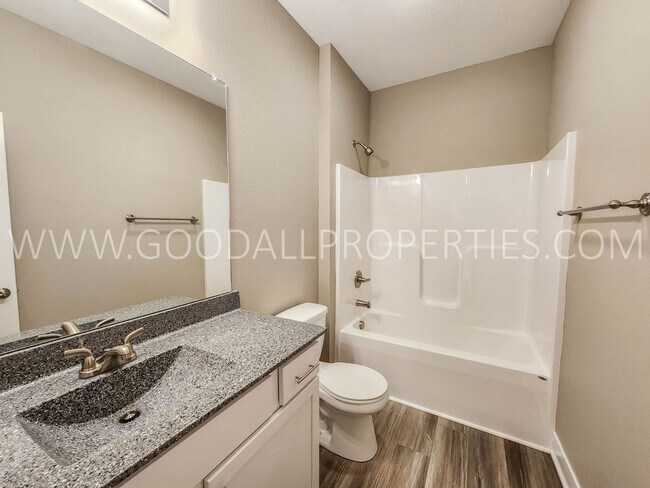 Building Photo - Spacious Waukee Ranch | 4 Bedrooms | 3-Car Garage | Finished Basement