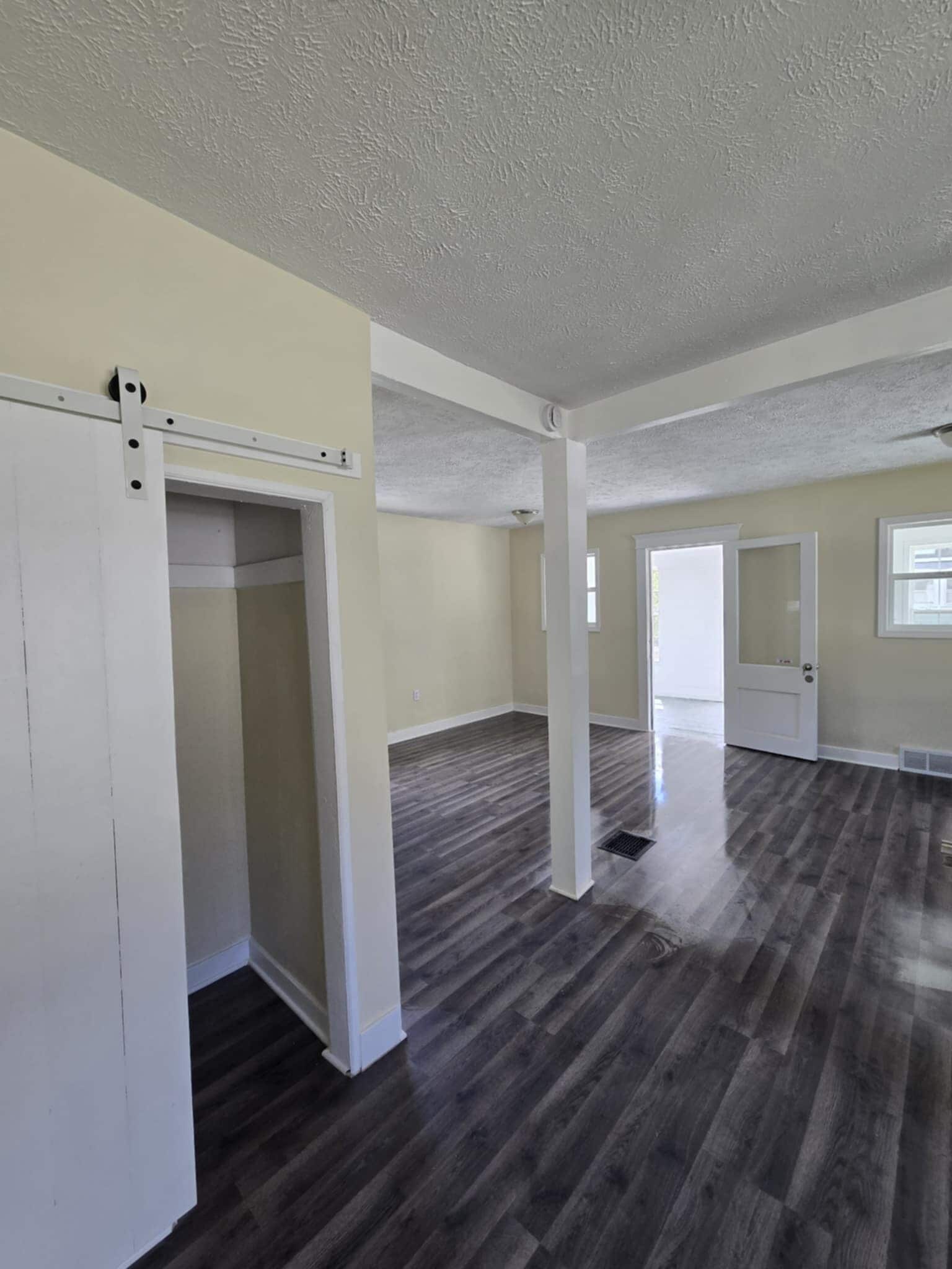 Dinning room area/front of living room and living room storage closet - 826 Clayton St