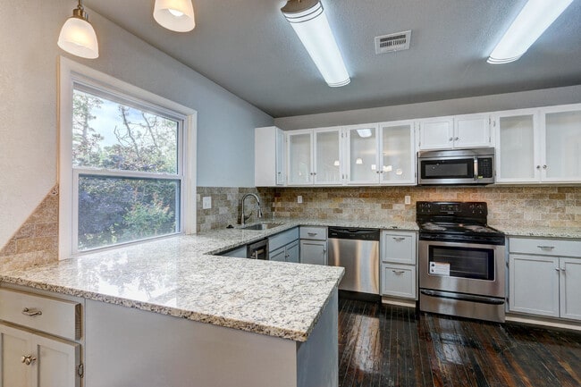 Building Photo - Remodeled Retreat w/ Covered Patio, Front ...