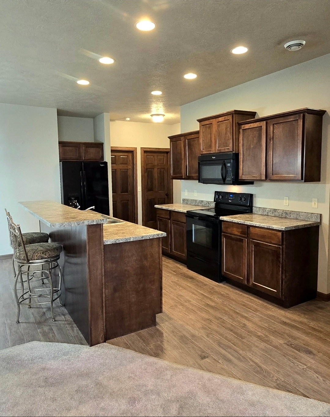 Beautiful Millwork, Eat in Counter and plenty of Counter space for Food Prep. - 3511 E Bison Trl