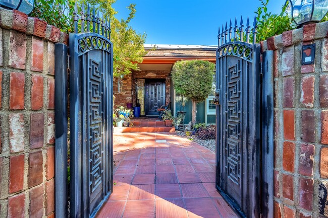 Private gated courtyard entry - 23333 Arminta St