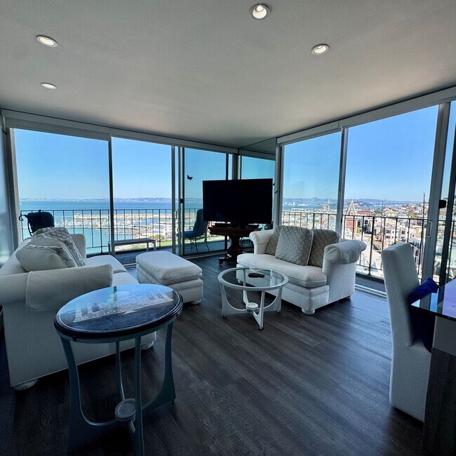 Building Photo - Just Unpack, Pour a Beverage, & Cue the Su...