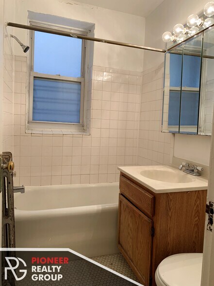 Building Photo - 705 W Belmont Ave