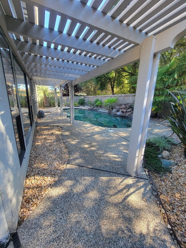 Building Photo - "Spacious 4-Bed, 3-Bath Oasis in Gold River with pool!"