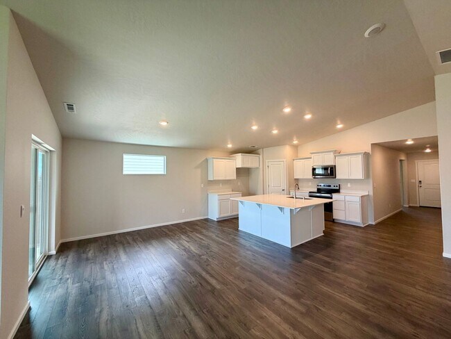 Building Photo - Beautiful & Brand New- 4 bed, 2 bath w/Quartz Countertops & Fenced Yard