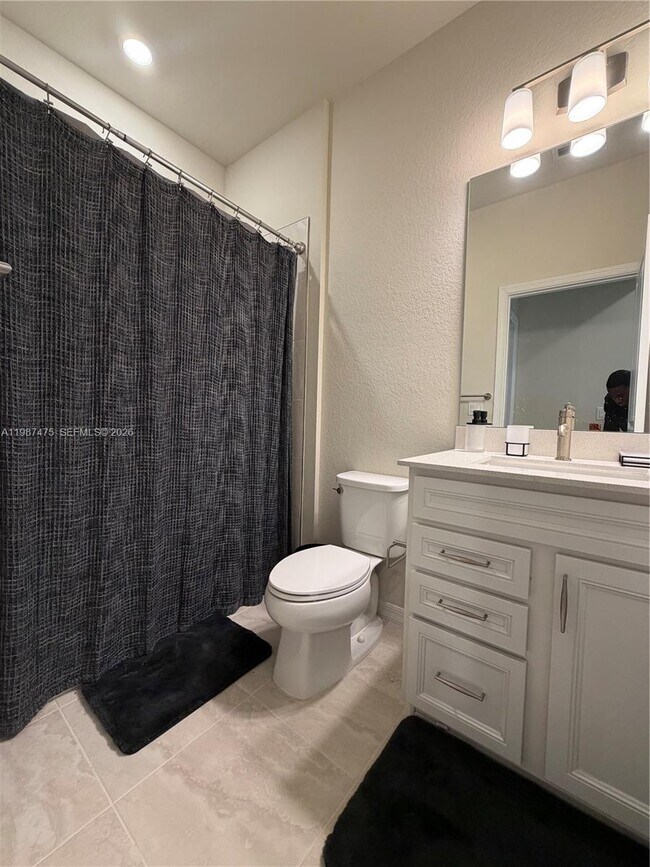 Building Photo - 12251 SW Periwinkle Ct