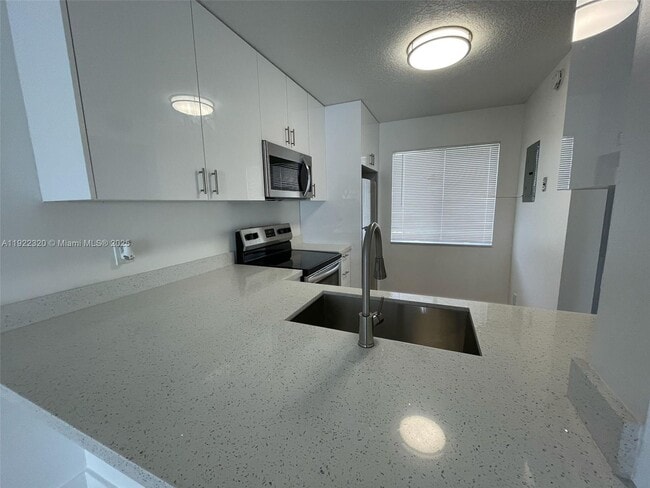 Building Photo - 8700 N Sherman Cir