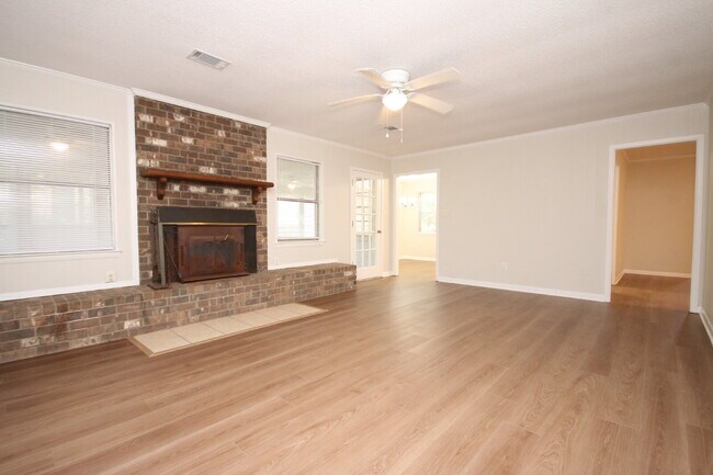 Building Photo - Fully Renovated 3BR/2BA Molino Home on a Spacious Lot Featuring Multiple Living Areas, Sunroom & ...