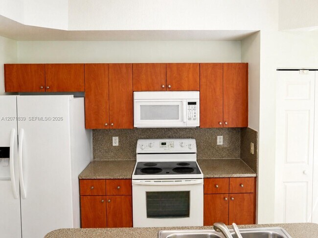 Building Photo - 4974 White Mangrove Way E
