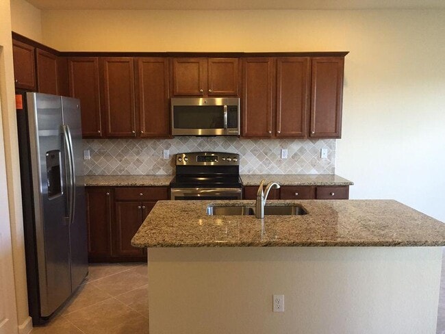 Building Photo - 10217 Wellington Parc Dr