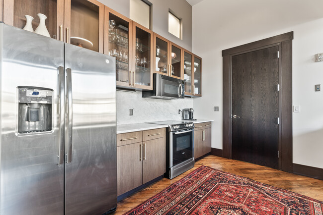 Sizable kitchen with natural light - 129 W Jackson Ave