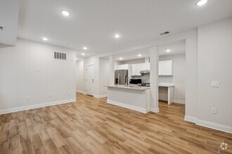 Building Photo - "NEW CONSTRUCTION 3-Bed Condo with Granite...