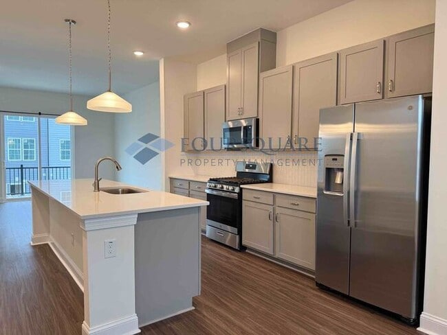 Building Photo - Bright End-Unit 3-Bed / 2.5-Bath Townhome with Flex Space, Gourmet Kitchen & 2-Car Garage – Walka...