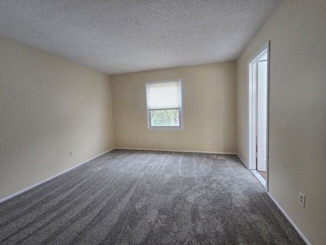 Building Photo - Recently painted & carpeted townhouse with 1,200+ SQ FT, 3-bedroom, 2.5 bathroom and lots of amen...