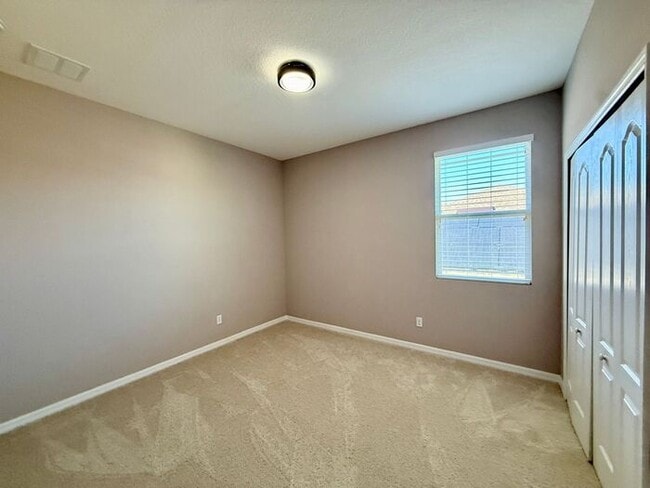 Building Photo - SPACIOUS Two Story Beautiful 5/4 Home in The Enclave At Aloma!