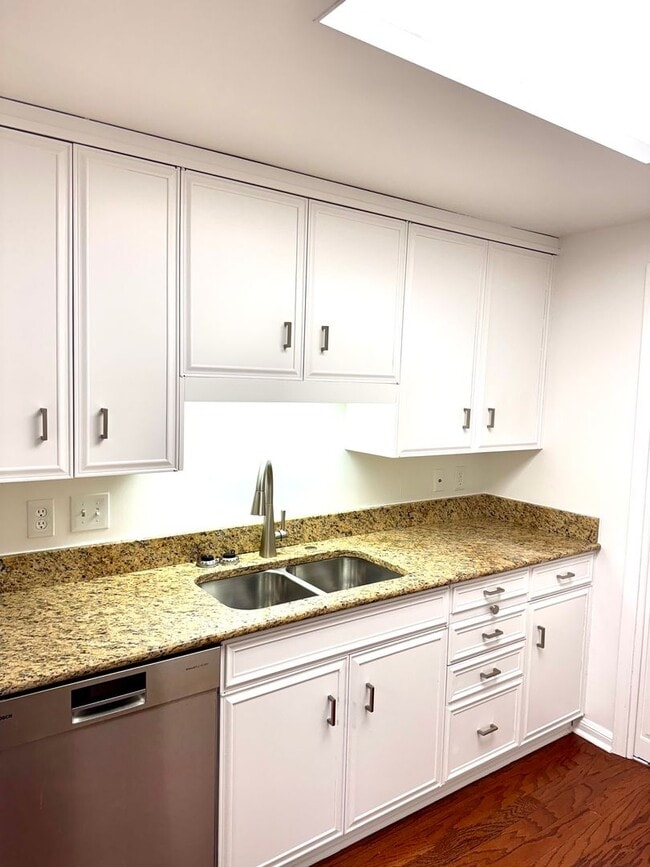 Building Photo - Experience Luxury and Prestige at Yorktown Condominiums