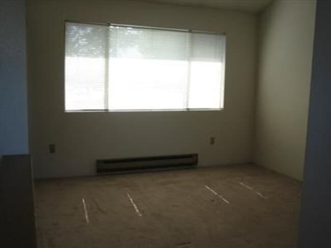 Building Photo - Bright & Private 1BR Townhome in Juanita – Garage, Patio & Prime Kirkland Location