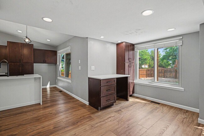 Building Photo - Updated 4BR Corner Lot Home with Finished Basement & 2-Car Garage