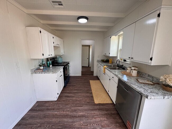 Building Photo - Brand New inside, great neighborhood and large fenced yard!  Call us today to make this your new ...