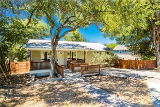 Building Photo - Stunning Renovation - New Hardwood flooring, tile in Kitchen. Granite countertops, breakfast bar