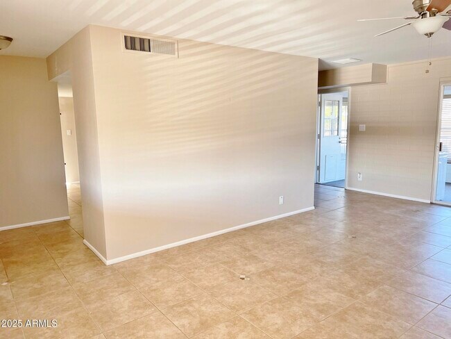 Building Photo - 12247 N Cherry Hills Dr W