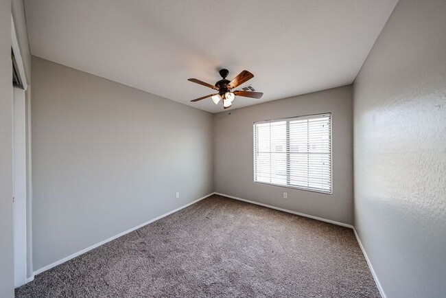 Building Photo - Welcome to this spacious 4 bedroom, 2.5 ba...