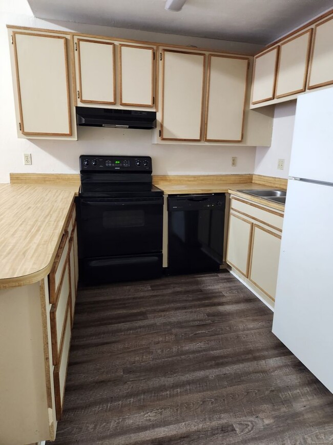 Building Photo - Two Bedroom, Two Bath Townhome With A Private Patio & Fenced Backyard.