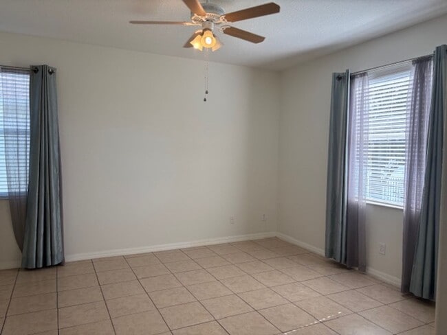 Building Photo - Water View 4/3 in Wyndham Lakes Estates near Lake Nona Medical City and O.I.A.