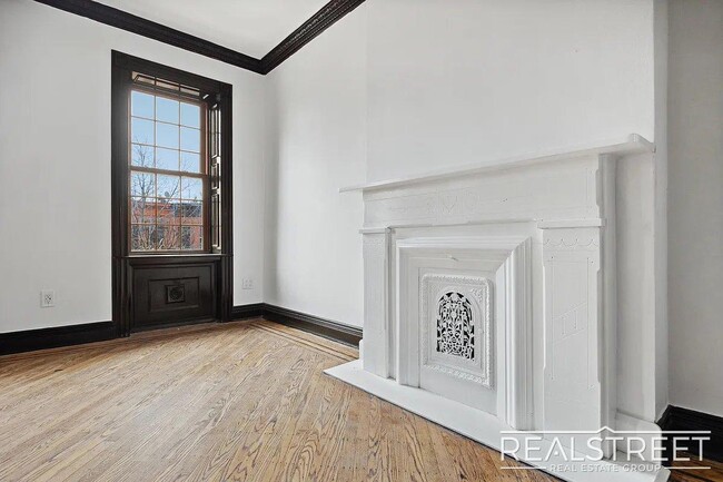 Building Photo - Timelessly Renovated Historic Triplex with...