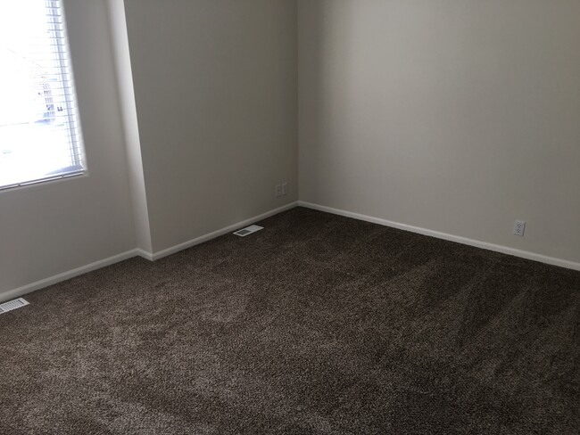 Bedroom one with en suite bathroom - 15026 Camden Ave