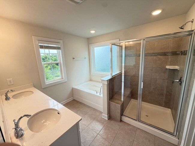 Building Photo - Beautiful Westbranch Home with 2-Car Garage, Covered Porch & Greenway Entrance Across the Street