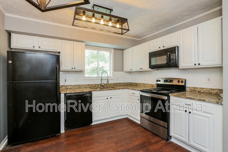 Building Photo - 6360 Ashdale Dr