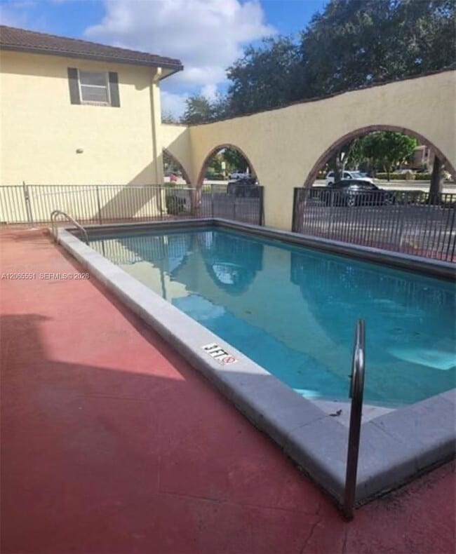 Building Photo - 10751 Royal Palm Blvd