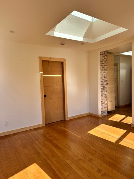 Livingroom looking at bedroom 1 and Kitchen - 1615 Shell Ave