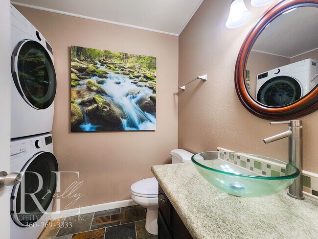 Building Photo - Modern Elegance Meets Tranquil Lakeside Living On Osprey Circle