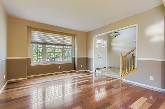 Building Photo - Spacious 4-Bedroom Home in Parker’s Desira...