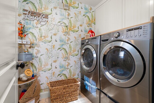 Building Photo - "Coastal Tommy Bahama at 208 East Balboa: Fully Furnished 3-Bed Sanctuary with Rooftop Deck