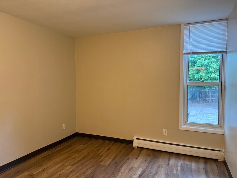 Large Bedroom with Window - 405 10th Ave N