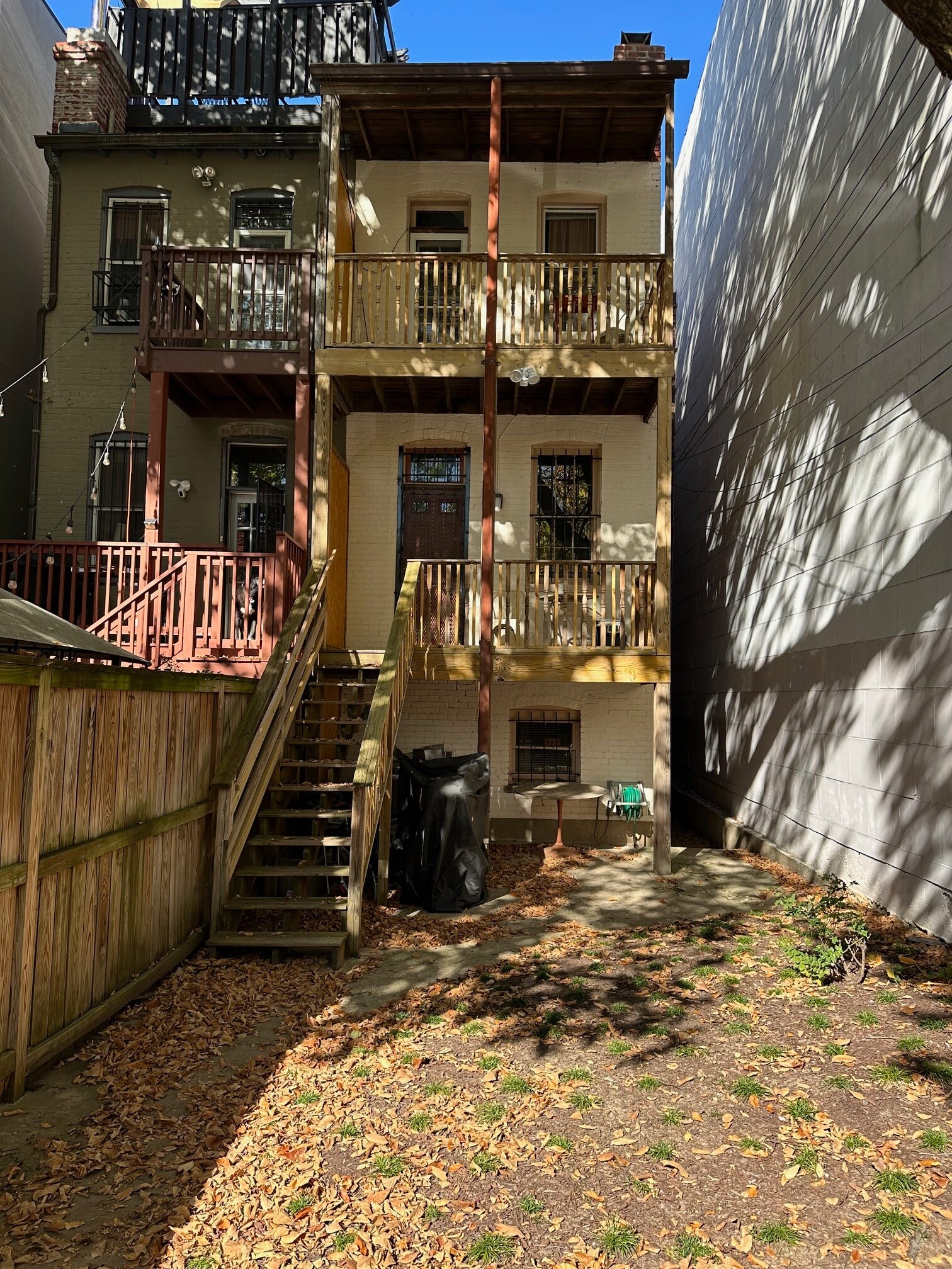 View of rear of home with double porches. - 1336 Kenyon St NW