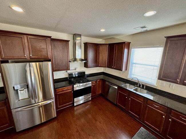 Building Photo - 4-Bedroom Home Ready 07-10-26!! Gourmet Kitchen - Fenced Backyard - Pet Friendly!