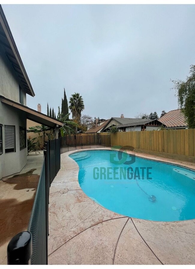 Building Photo - Back on the Market! Beautiful 3 bedroom 2.5 Bath home READY NOW in MODESTO!! With POOL!!