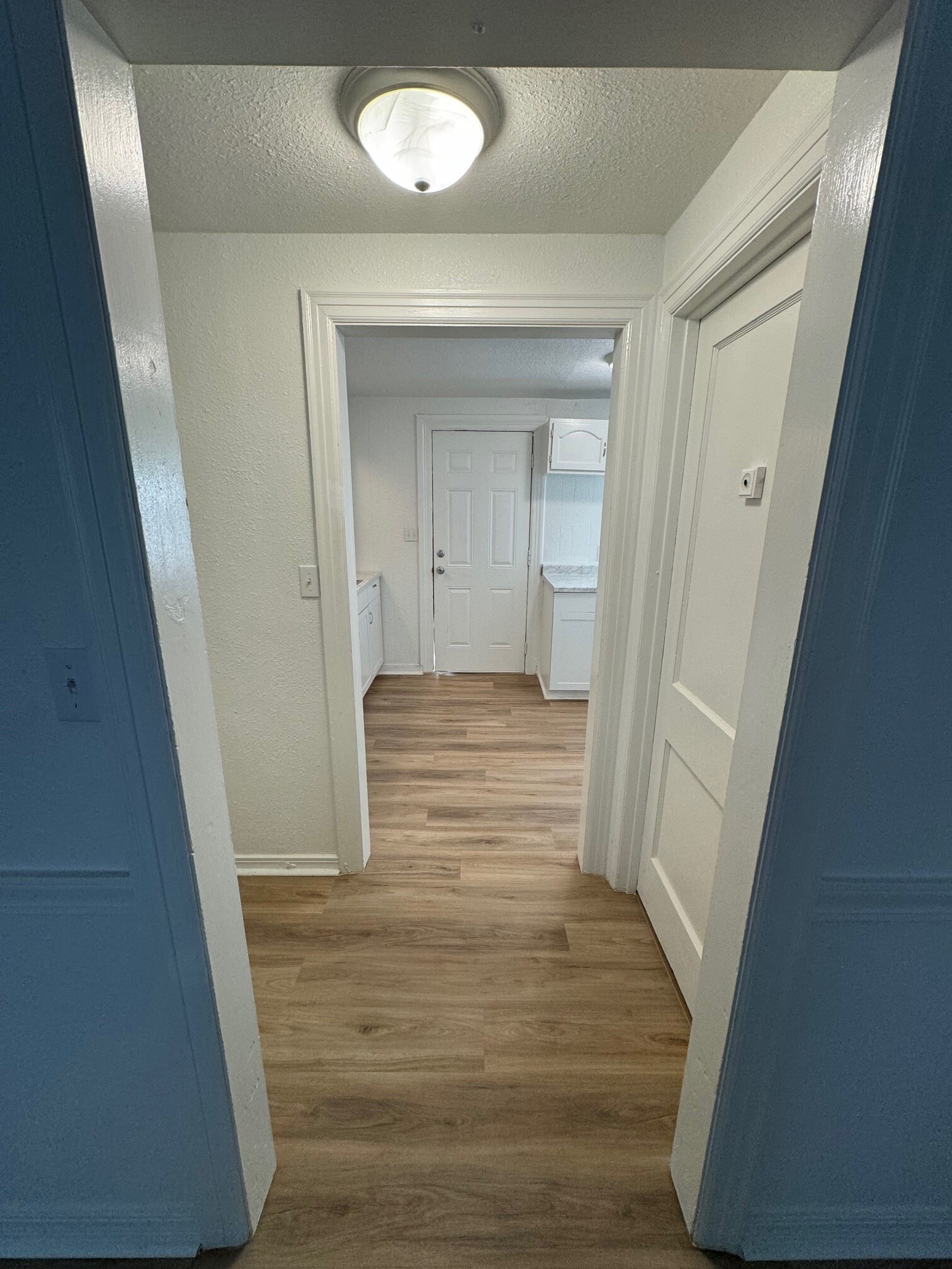 From living room into kitchen and back door - 2223 N Gatewood Ave