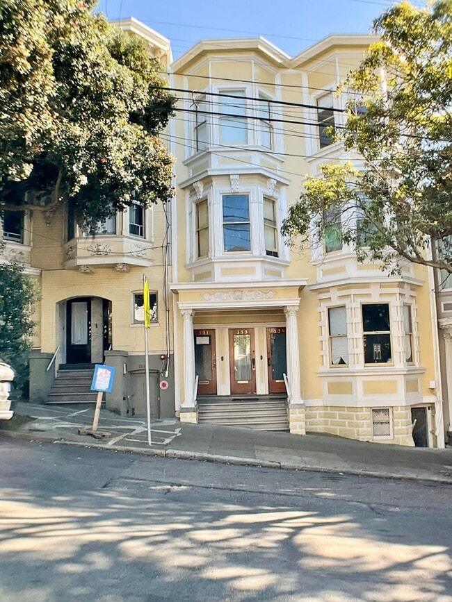 Building Photo - REMODELED 4BR/3BA. In Unit Laundry! Dishwasher! Bay Windows!